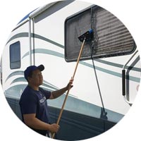 Suns Auto Detailing cleaning exterior of RV